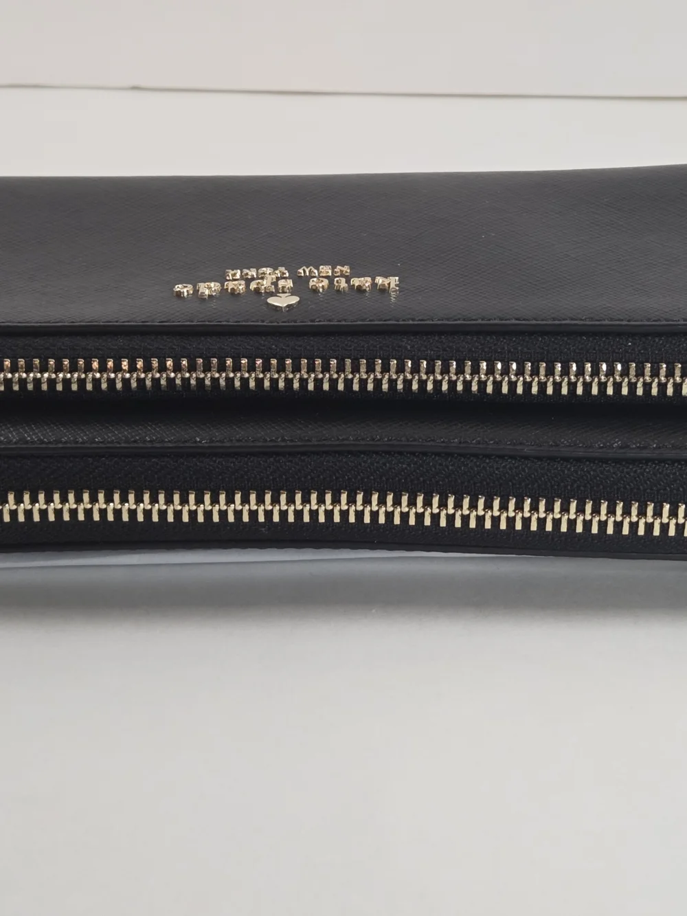 kate spade New York Black Saffiano Wristlet with Gold Logo